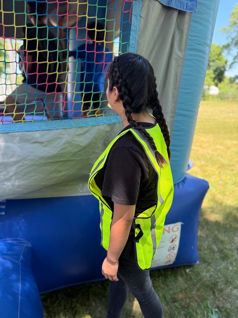 Families with children at outdoor community event activation